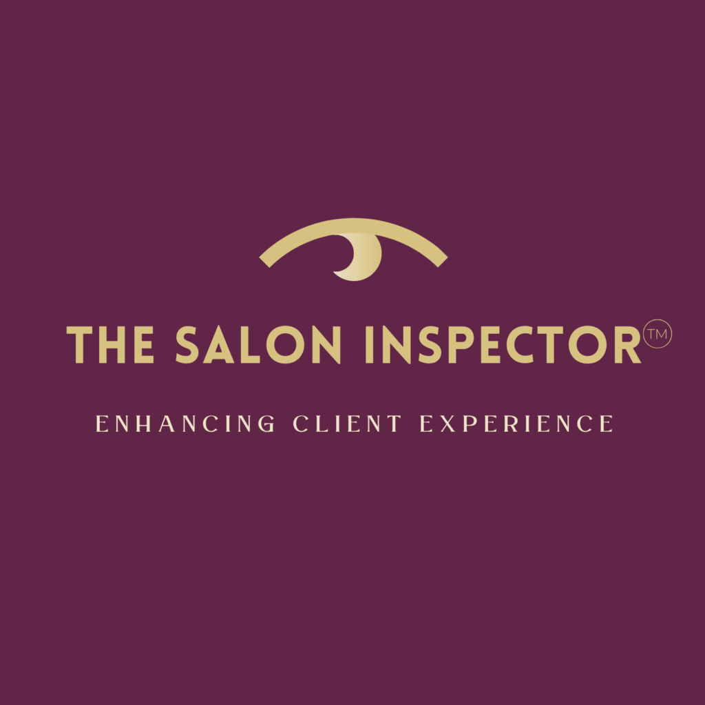 The Salon Inspector™️ logo mulberry background with gold text