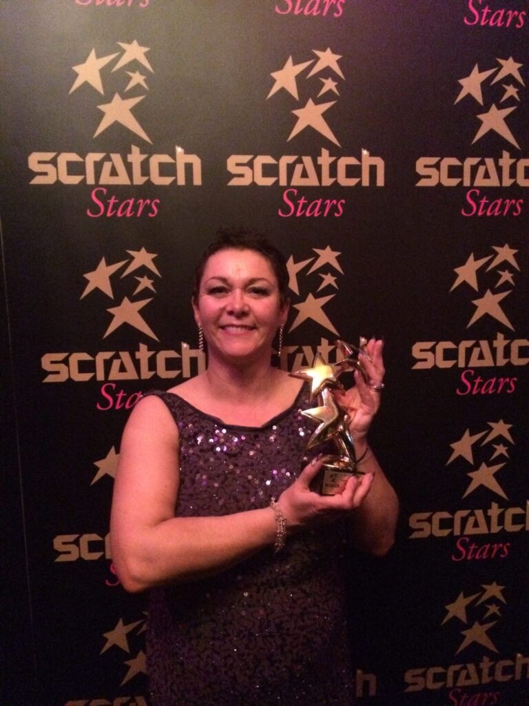 Sue Davies winning Salon of the Year Scratch Stars Awards 2014